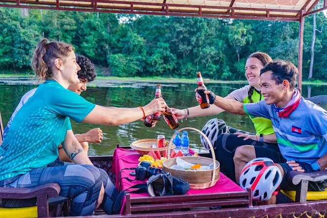Angkor Bike & Gondola Ride at Twilight - The private dragon boat on Angkor Thom’s moat