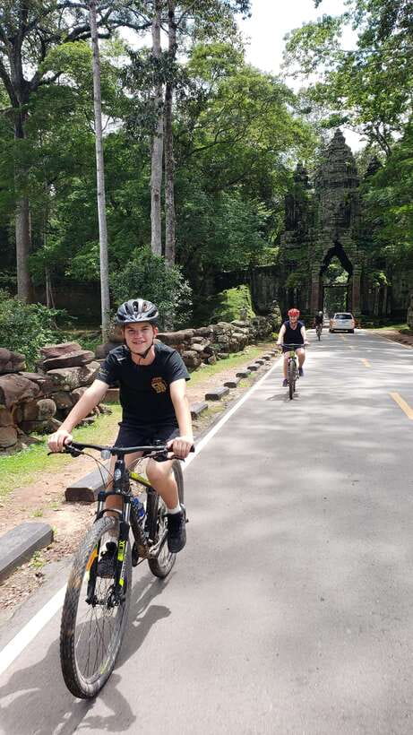 Angkor Jungle Biking Adventure Private Cycling Tour - Angkor Thom and Bayon reward close looking