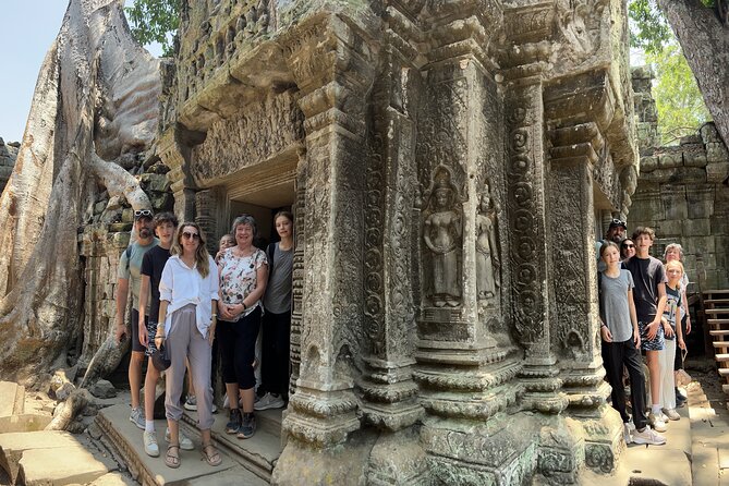 Angkor Sunrise Bike Tour with Lunch Included - Ta Prohm with the trees overhead