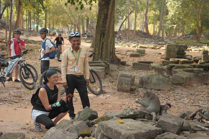 Angkor Sunrise Bike Tour with Lunch Included - What the $55 price covers