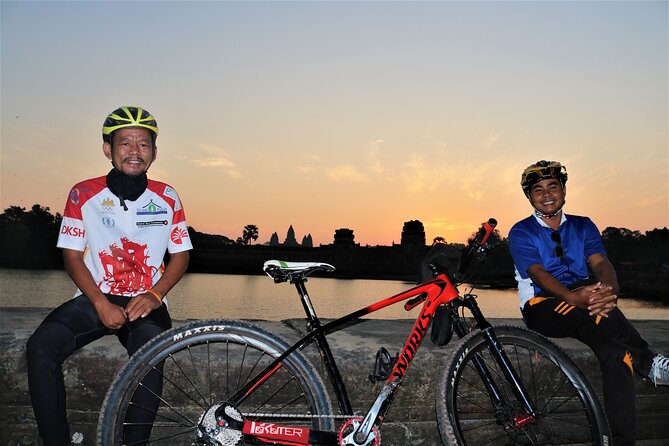 Angkor Sunrise Expedition Cycling Through Serene Backroads - Backroads and the tree roots of Ta Prohm