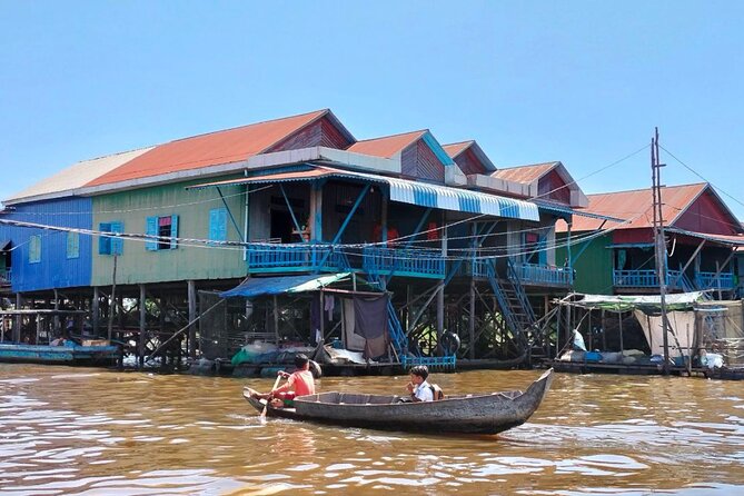 Angkor Sunrise & Floating Village Sunset Full-Day Siem Reap Tour - Bayon’s stone faces at Angkor Thom