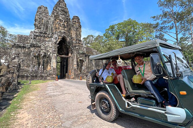 Angkor Wat Sunrise and Market Tour by Jeep - Ta Prohm, where trees take over