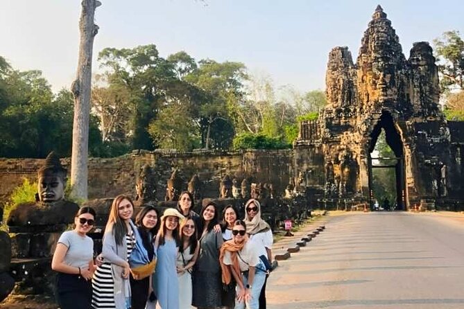 Angkor Wat Sunset Small Group Tour with Lunch Included - The climb to Phnom Bakheng at sunset