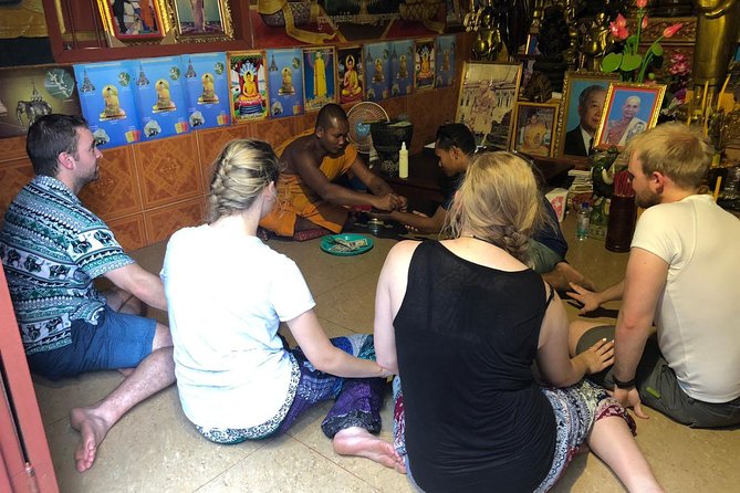 Buddhist Water Blessing and Real Life Experience with Local - What the guide adds to the experience
