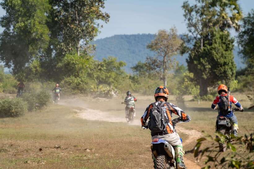 Krong Siem Reap: Kulen Mountain Trails Dirt Bike Adventure - Cooling off at Kulen Waterfall