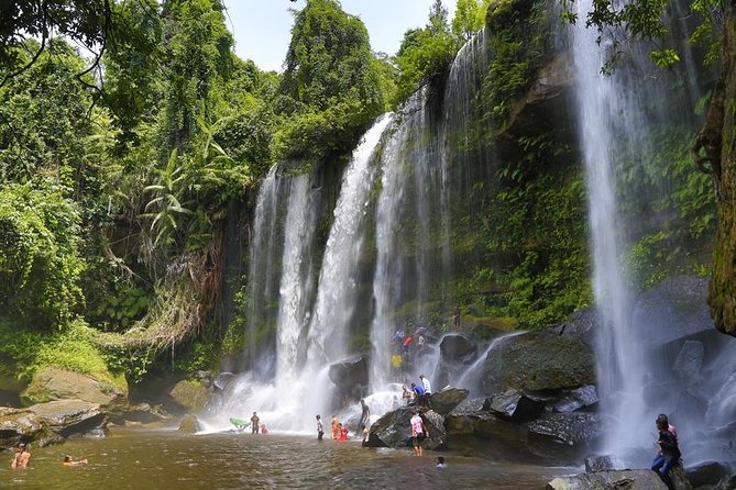Kulen Waterfall and 1000 Lingas River Private Tour - Cooling off at Phnom Kulen waterfall