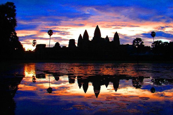 One Day tour with sunrise in car with A/C or Van & Guide. - Angkor Thom’s South Gate and Baphuon