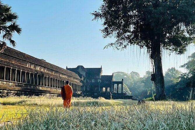 One Full Day Private tour of Angkor Wat, Ta Prohm, Angkor Thom & Banteay Srie - Bayon and its stone faces