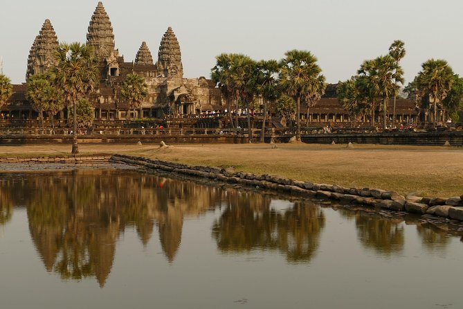 Personalised Angkor Wat Day Tour by an Air-conditioned Car - Angkor Thom South Gate and the face towers of Bayon