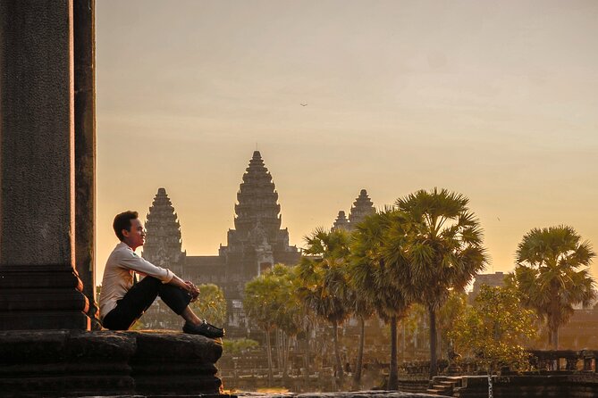Personalised Angkor Wat Sunrise Tour by an air-conditioned car - Ta Prohm, roots over stone for one hour
