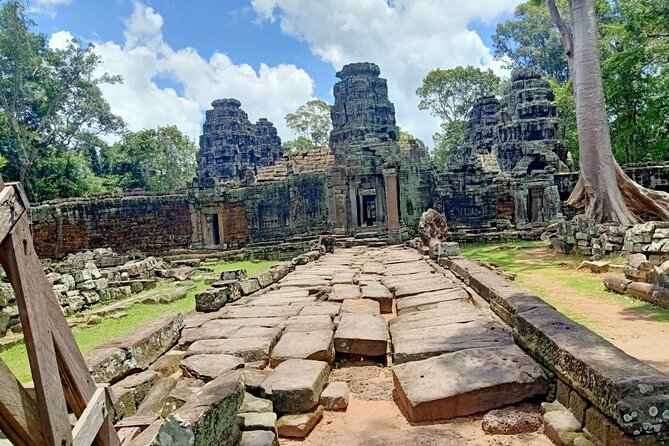 Private Angkor Wat Guided Sunset Tour - Ta Prohm and the power of the jungle setting