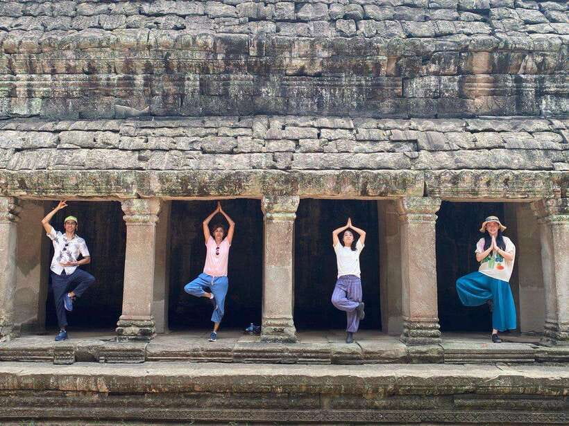 Private Angkor Wat Sunset Tour with Lunch and Snack Included - Ta Prohm, where roots cover the stone