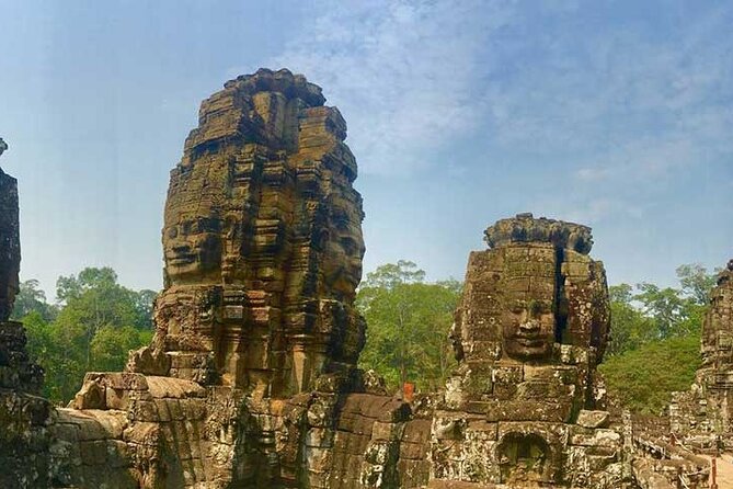 Private Day Angkor Wat Temple and Banteay Srei Temple Tour - Ta Prohm: roots, corridors, and a royal monastery