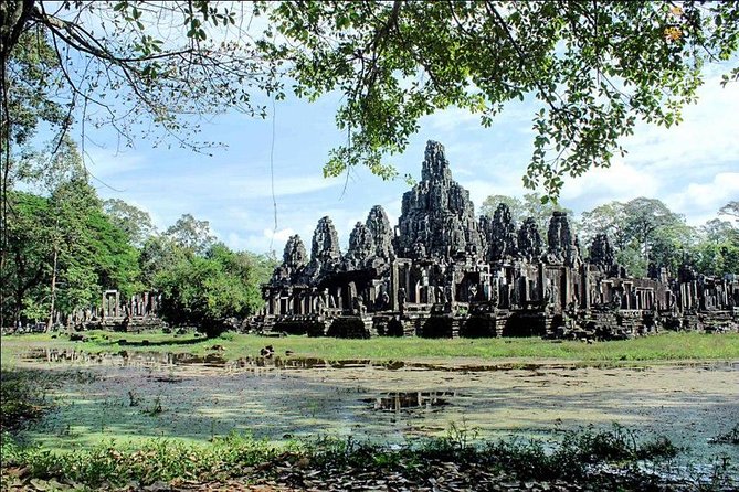 Shared Tour to Angkor Wat, Bayon and Ta Prohm Temples - Bayon’s stone faces and one hour among the towers