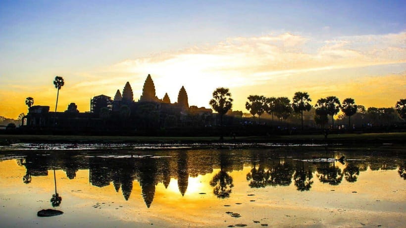 Siem Reap: Angkor Wat, Bayon & Ta Prohm Guided Tour - Ta Prohm and the trees pressing through the ruins