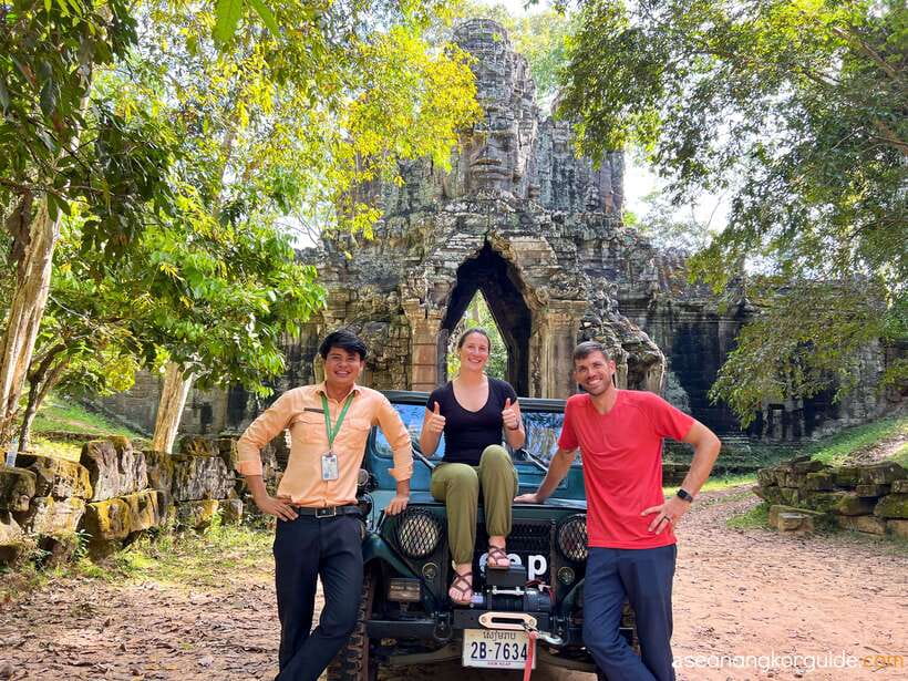 Siem Reap: Angkor Wat Sunrise and Market Tour by Jeep - Bayon’s stone faces and Angkor Thom’s Victory Gate