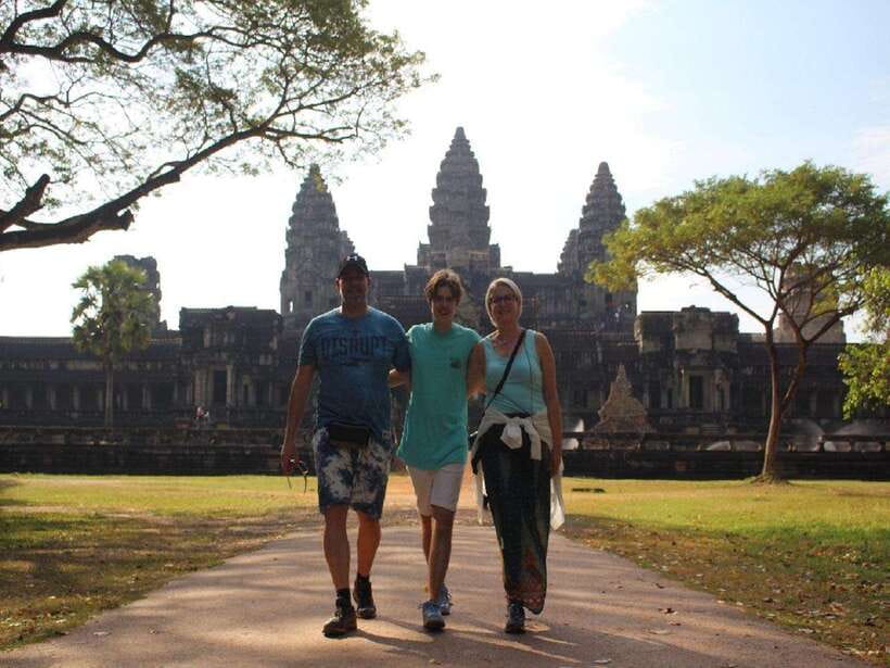 Siem Reap: Angkor Wat Tour Explore The Most Iconic Temples - Ta Prohm and the trees over the stone