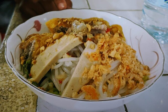 Siem Reap Authentic Breakfast and Market Tour - Stop three: bai set chrouk at Wat Bo Temple