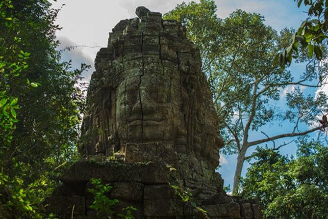 Siem Reap Full Day Angkor Wat Tour Small Group - Angkor Thom and Bayon: a city gate and a forest of stone faces
