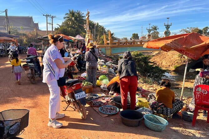 Siem Reap: Morning Bike Tours with Local Market & Lunch - A temple visit and a monk’s blessing