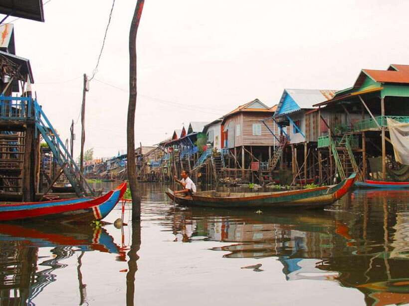 Siem Reap: Tonle Sap, Kampong Phluk & Floating Village Tour - The larger boat and Tonlé Sap at sunset