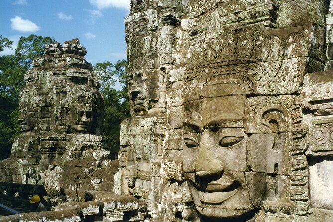 Sun Rise at Angkor Wat Small Group Day Tour from Siem Reap - The South Gate and the stone figures of Angkor Thom