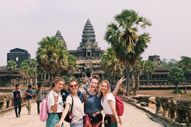 Sun Rise at Angkor Wat Small Group Day Tour from Siem Reap - Ta Prohm and the trees over the ruins