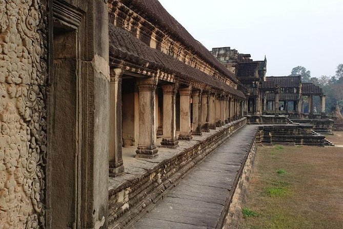 Sunrise Tour of Angkor Temples from Siem Reap - Bayon Temple and its many stone faces