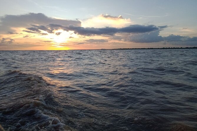 Sunset on Tonle Sap Lake - Why Tonle Sap makes a good afternoon escape