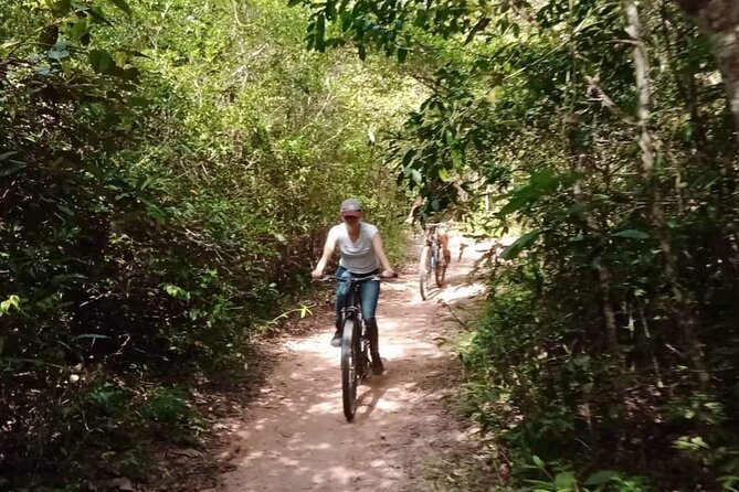 Sunset or sunrise bicycle tour around Angkor Wat and nearby temples - Guide quality and the human side of the tour